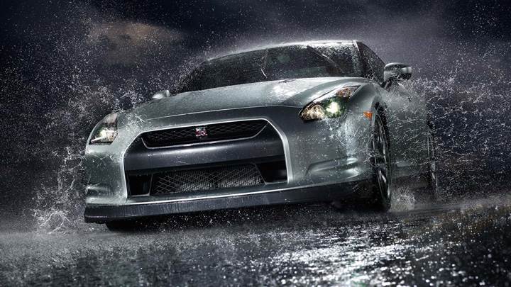 Nissan Gtr Front Pose After Rain In Black Night